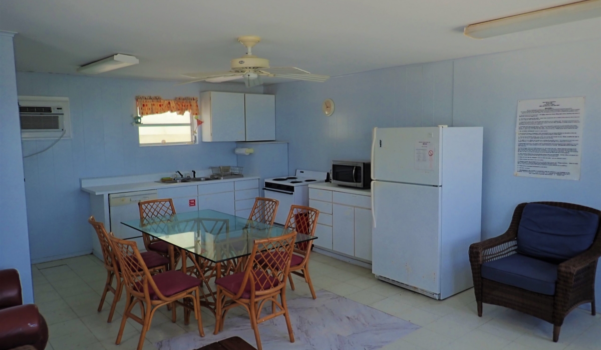 The fully equipped kitchen next to the living area.